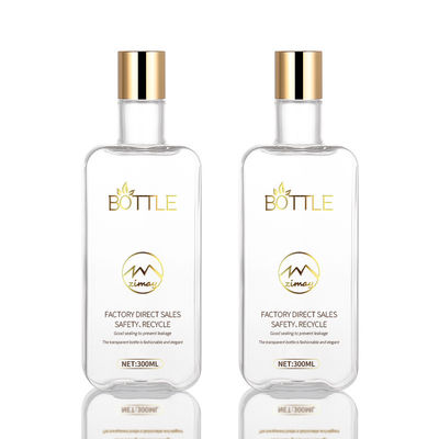 Plastikowa butelka z nakrętką do wyciskania Airless 300 ml ze złotą zakrętką