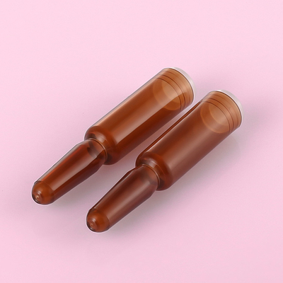 Bursztynowe plastikowe fiolki z serum, ampułka do esencji kosmetycznej o pojemności 1 ml